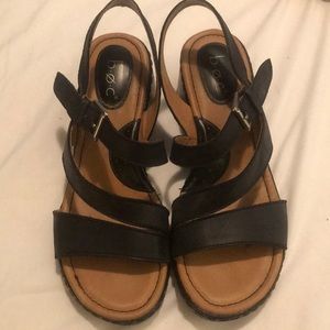 BOC black leather wedges with 2 1/4 inch heels.